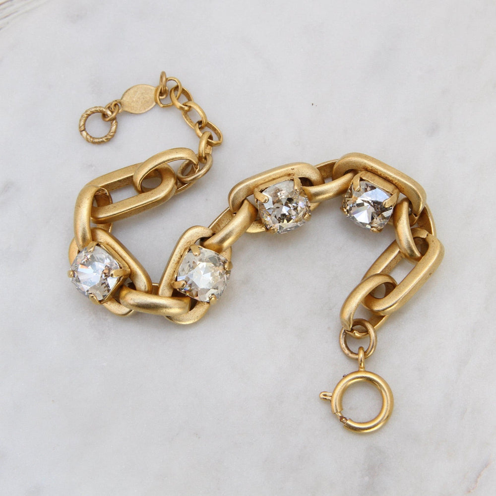 
                      
                        BRC-JM Chunky Oval Link Bracelet with Four Crystals - Gold Plate
                      
                    