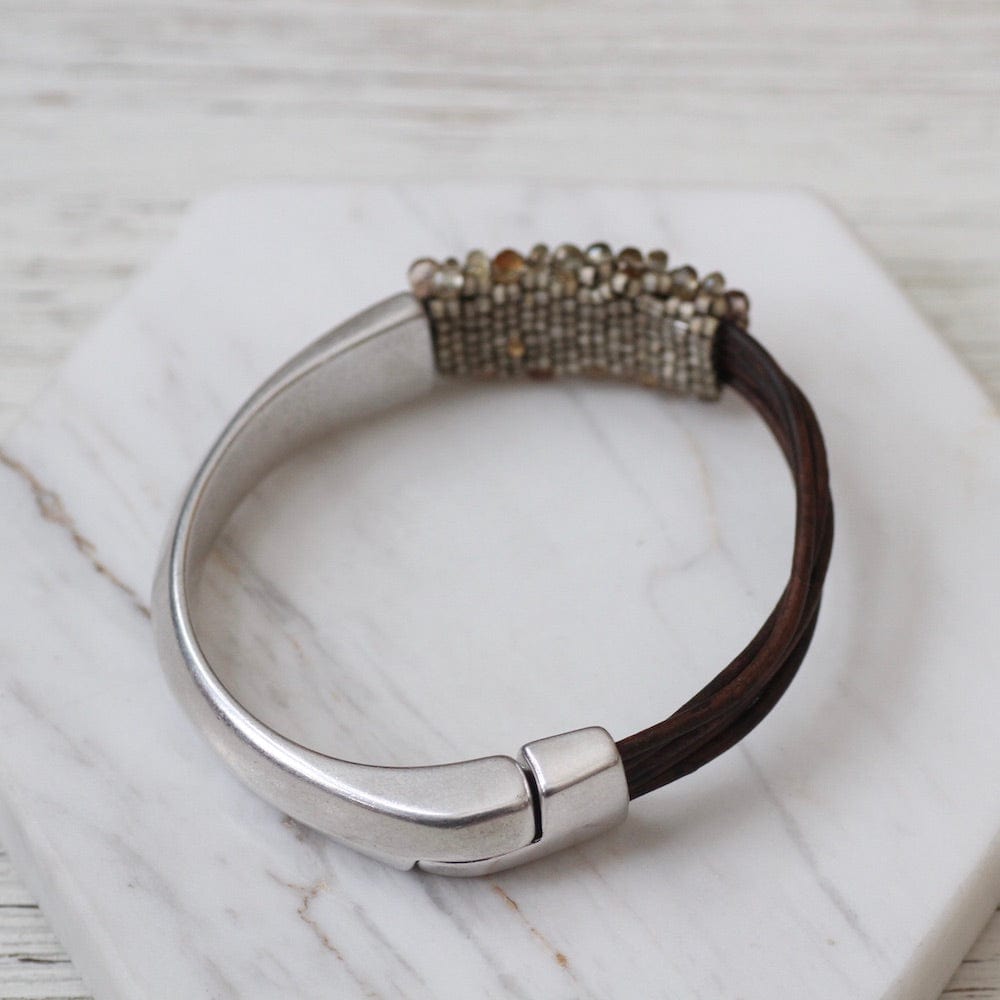 
                  
                    BRC-JM Earth Tone Zircon 1/2 Cuff Bracelet
                  
                