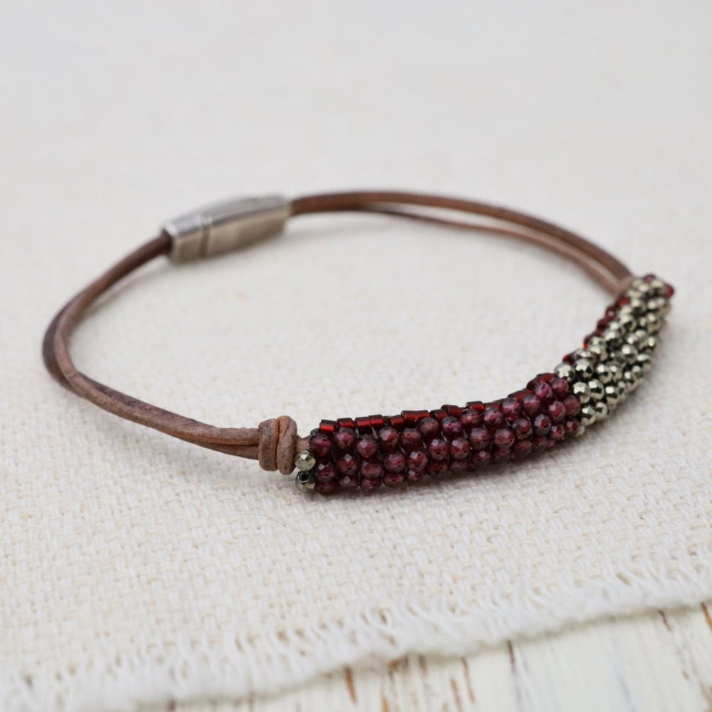 
                  
                    BRC-JM Garnet/Pyrite with Hand-Tied Double-Strand Grey Leather Bracelet
                  
                