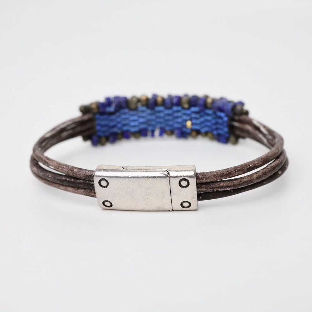 
                  
                    BRC-JM Hand Stitched Afghan Lapis & Pyrite Leather Bracelet
                  
                