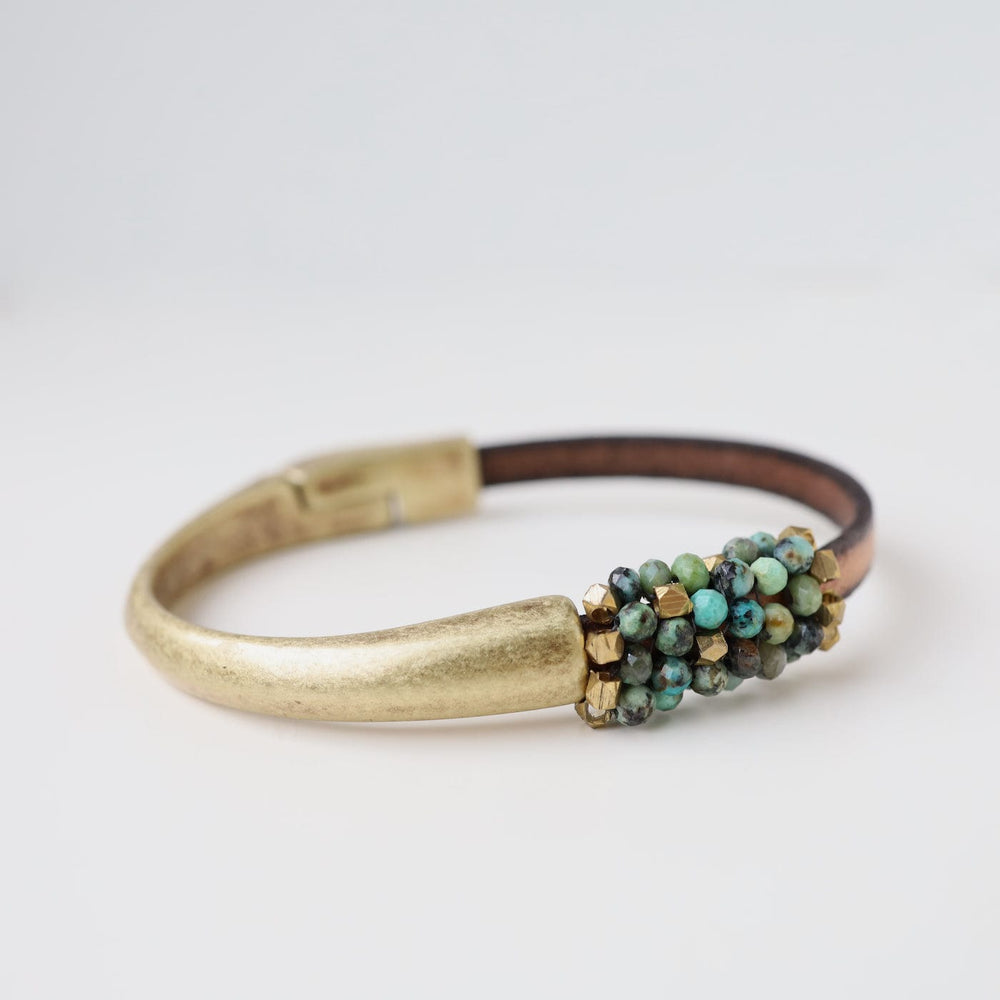 
                  
                    BRC-JM Hand Stitched African Turquoise and  Brass Bracelet
                  
                