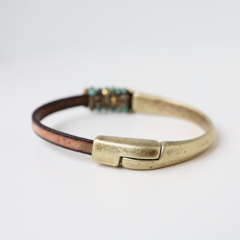 
                  
                    BRC-JM Hand Stitched African Turquoise and  Brass Bracelet
                  
                