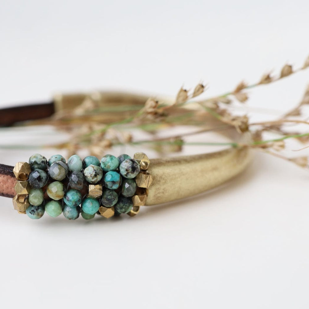 
                  
                    BRC-JM Hand Stitched African Turquoise and  Brass Bracelet
                  
                