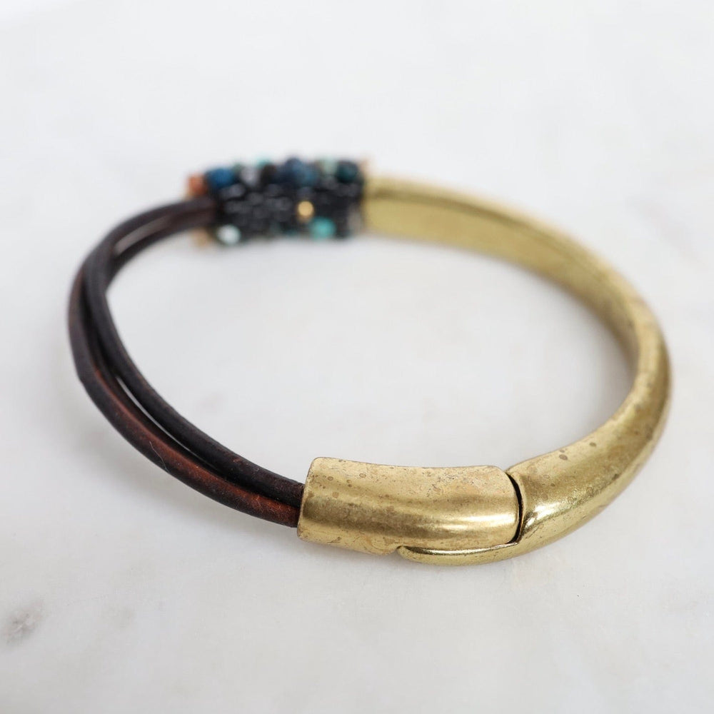 
                  
                    BRC-JM Hand Stitched Apatite on Multi Dark Brown Leather & Brass 1/2 Cuff
                  
                