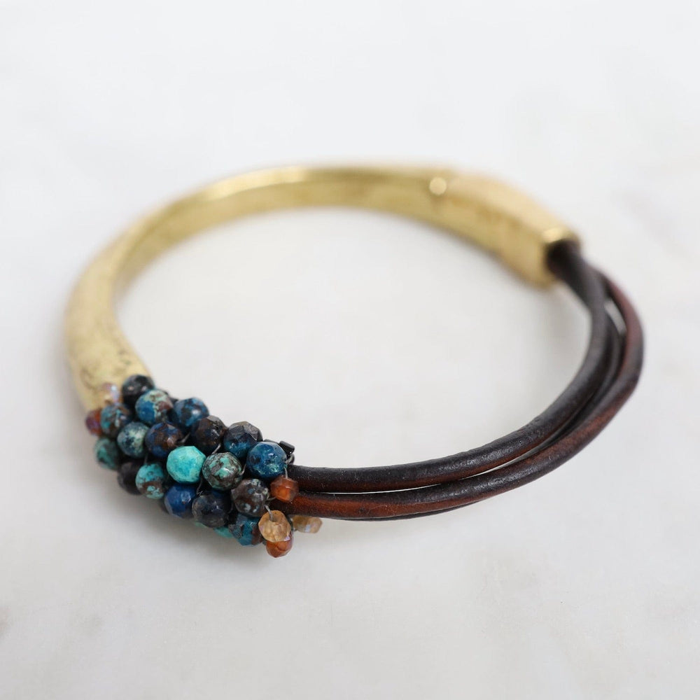 
                  
                    BRC-JM Hand Stitched Apatite on Multi Dark Brown Leather & Brass 1/2 Cuff
                  
                