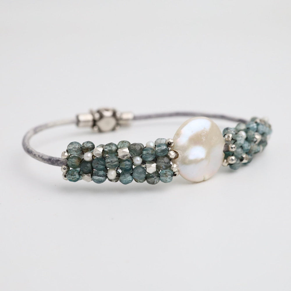 
                  
                    BRC-JM Hand Stitched Aquamarine, Sterling Silver & Pearl Leather Bracelet
                  
                