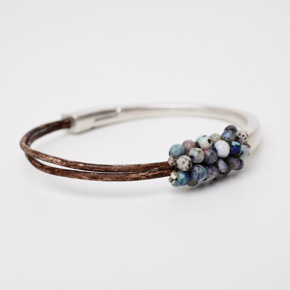 
                  
                    BRC-JM Hand Stitched Australian Blue Opal Bracelet
                  
                