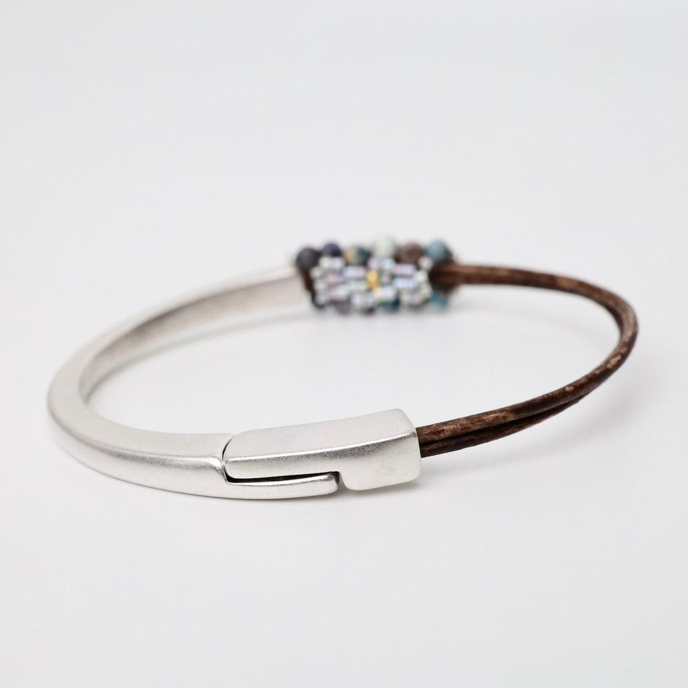 
                  
                    BRC-JM Hand Stitched Australian Blue Opal Bracelet
                  
                