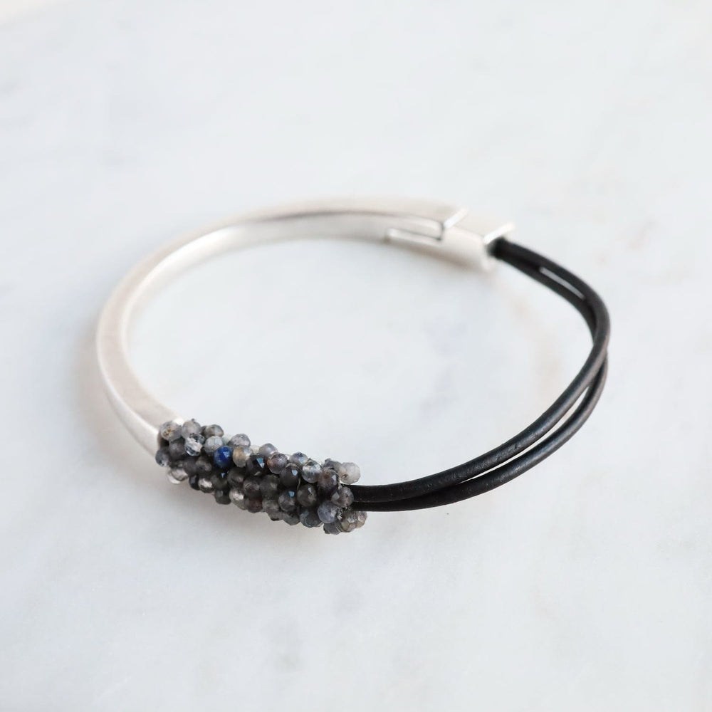 
                  
                    BRC-JM Hand Stitched Black Iolite & Smokey Lab Mix Bracelet
                  
                