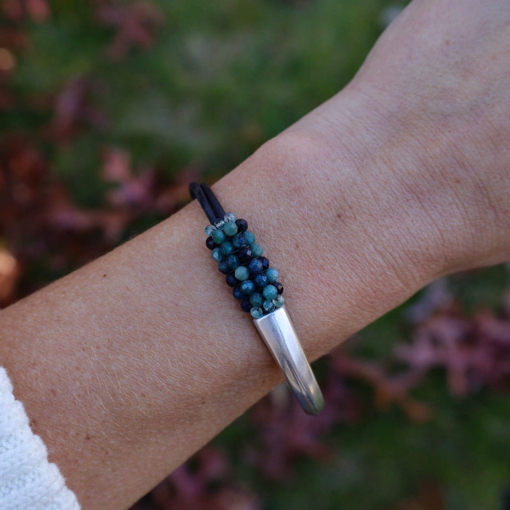 
                      
                        BRC-JM Hand Stitched Blue Tourmaline Half Cuff Bracelet
                      
                    