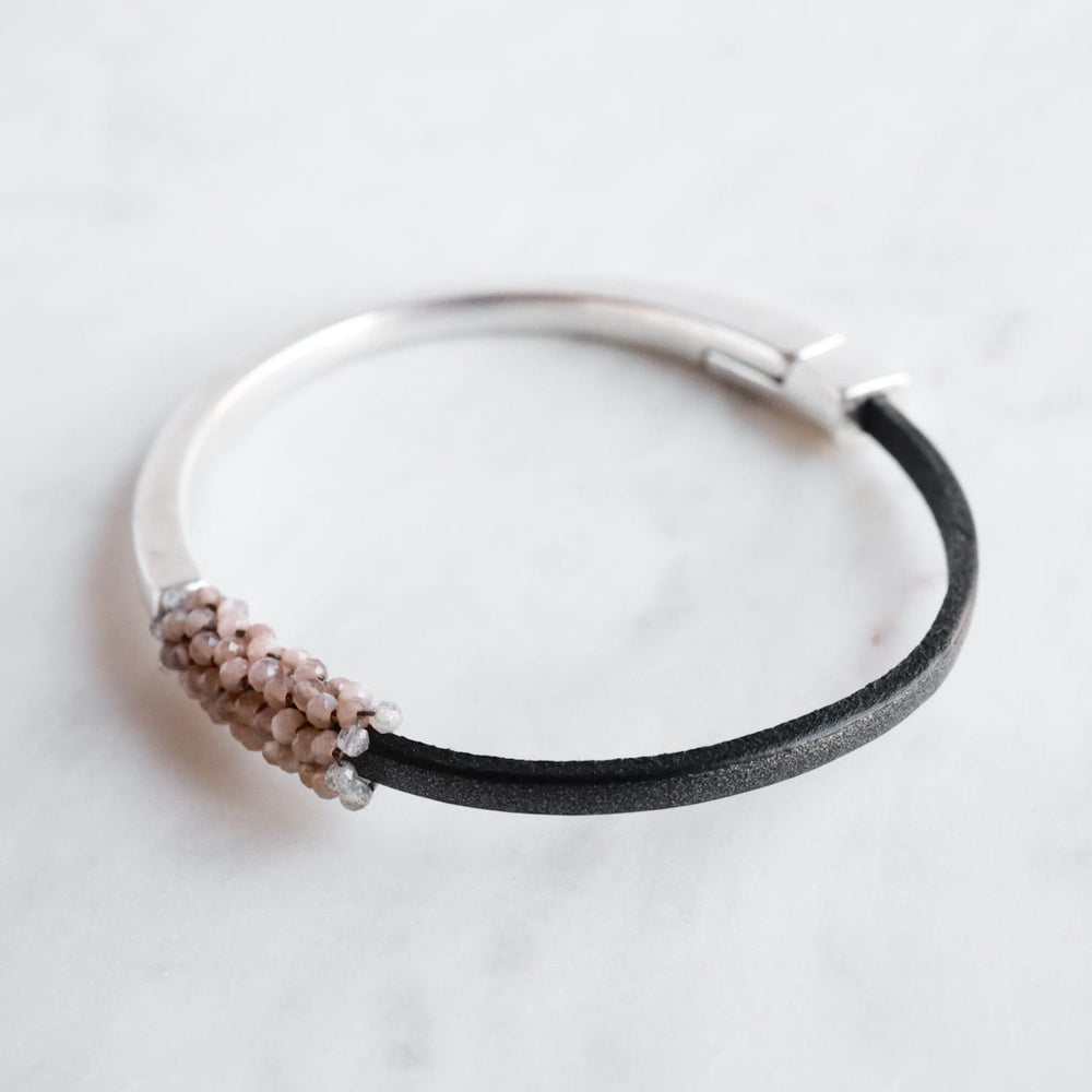 
                  
                    BRC-JM Hand Stitched Blush Moonstone Bracelet
                  
                