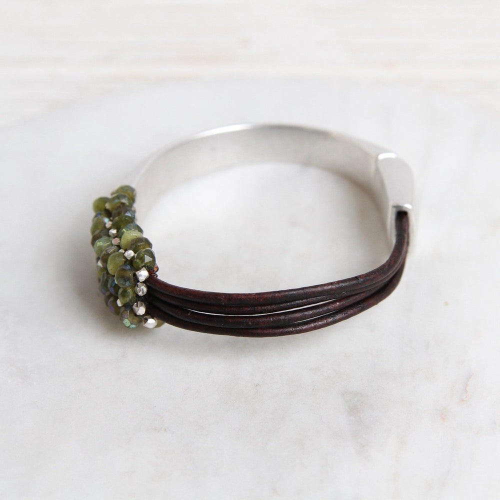 
                  
                    BRC-JM Hand Stitched Coated Green Garnet & Sterling Silver 1/2 Cuff Bracelet
                  
                