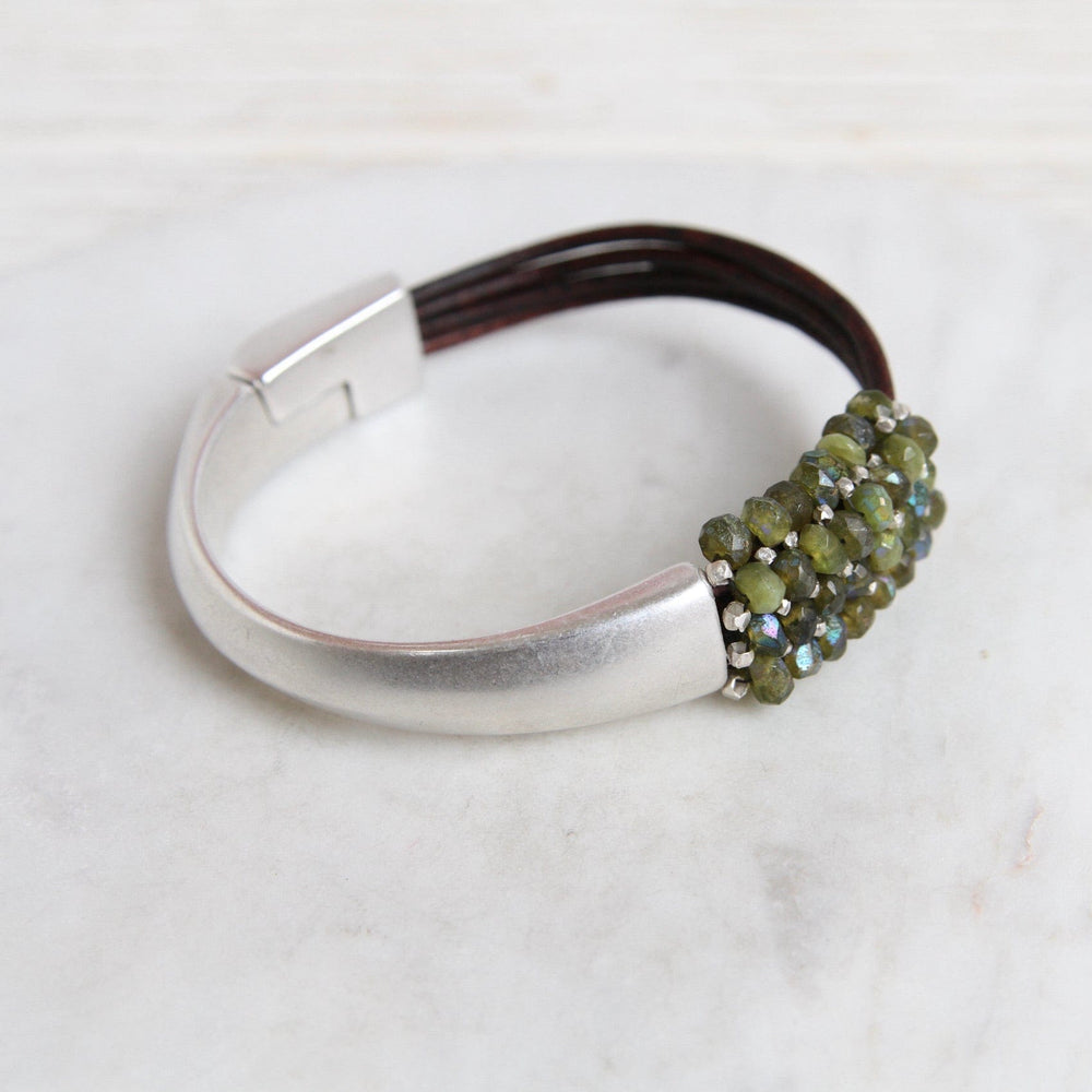 
                  
                    BRC-JM Hand Stitched Coated Green Garnet & Sterling Silver 1/2 Cuff Bracelet
                  
                