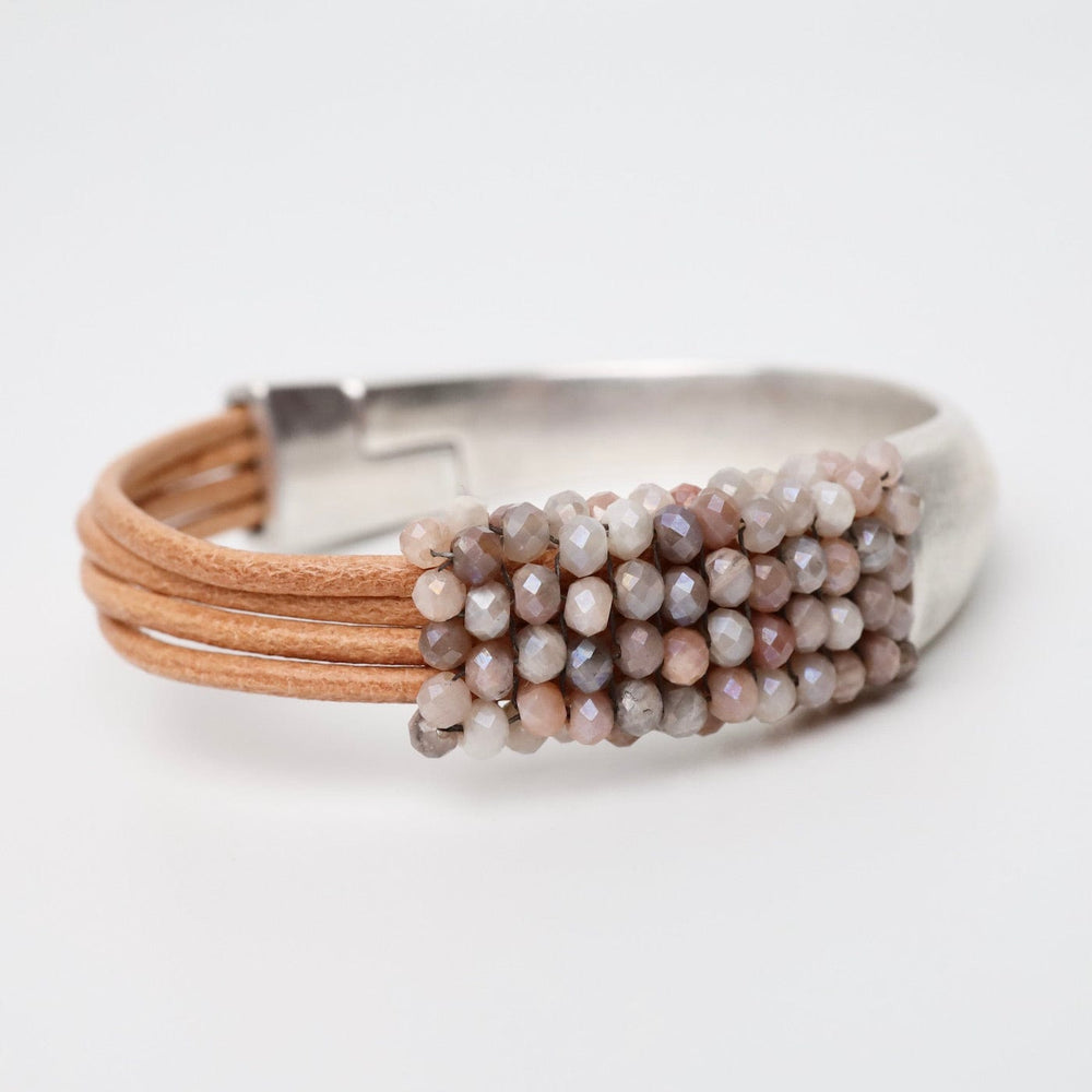 
                      
                        BRC-JM Hand Stitched Coated Moonstone Half Cuff Bracelet
                      
                    