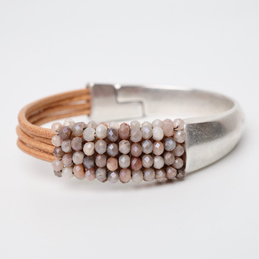 
                      
                        BRC-JM Hand Stitched Coated Moonstone Half Cuff Bracelet
                      
                    