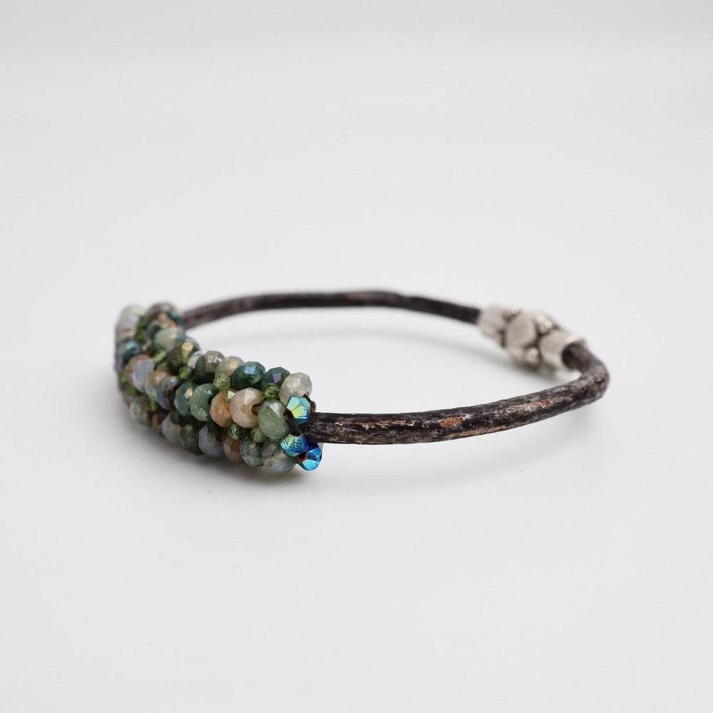 
                  
                    BRC-JM Hand Stitched Coated Quartz & Green Topaz Leather Bracelet
                  
                