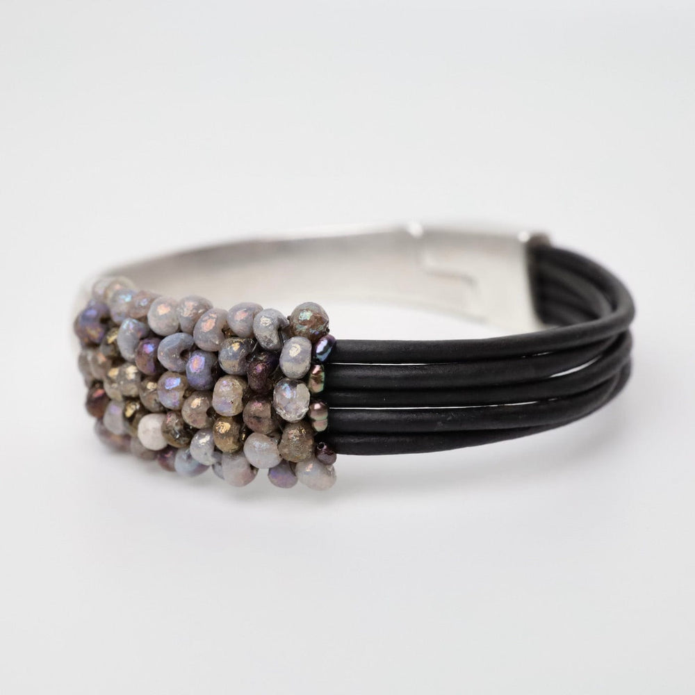 
                  
                    BRC-JM Hand Stitched Cobblestone Silverite Half Cuff Bracelet
                  
                