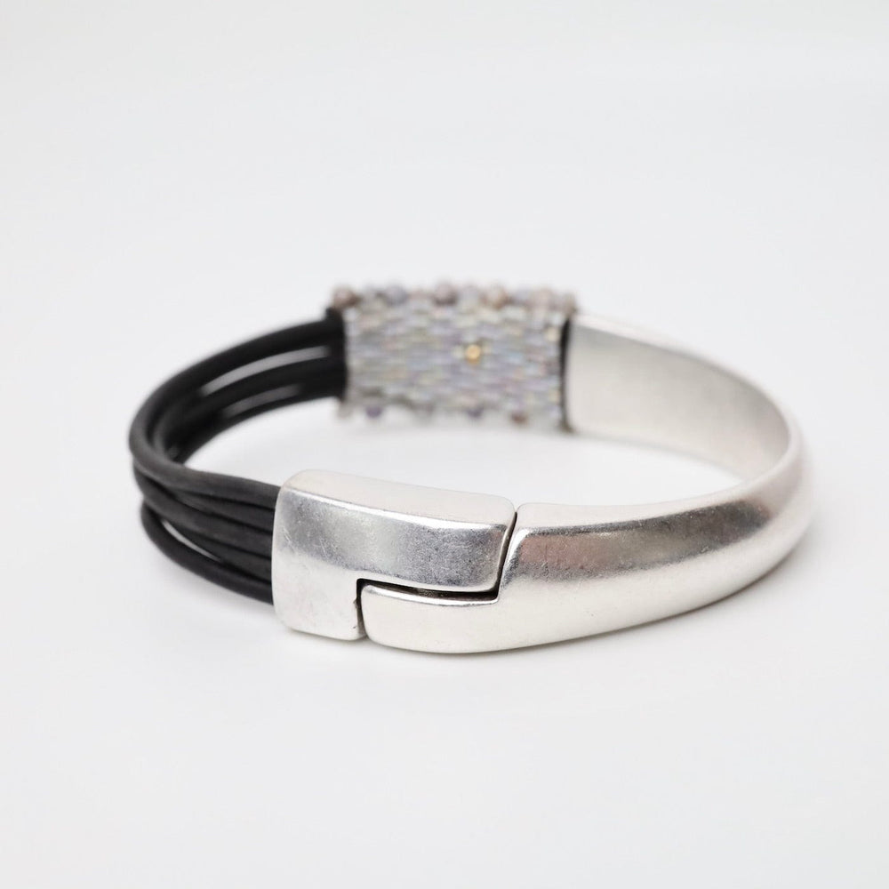 
                  
                    BRC-JM Hand Stitched Cobblestone Silverite Half Cuff Bracelet
                  
                