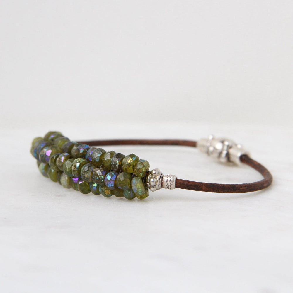 
                  
                    BRC-JM Hand Stitched Faceted Coated Green Garnet Bracelet
                  
                