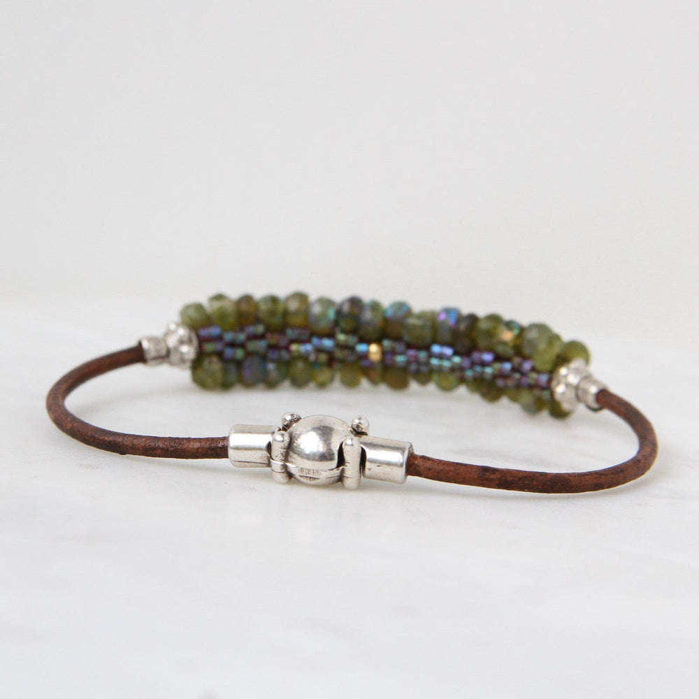 
                  
                    BRC-JM Hand Stitched Faceted Coated Green Garnet Bracelet
                  
                