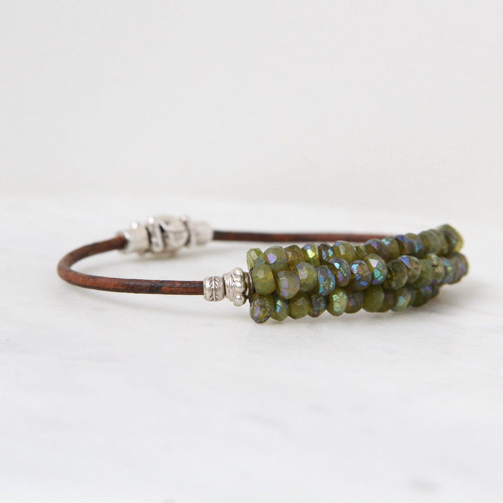 
                  
                    BRC-JM Hand Stitched Faceted Coated Green Garnet Bracelet
                  
                