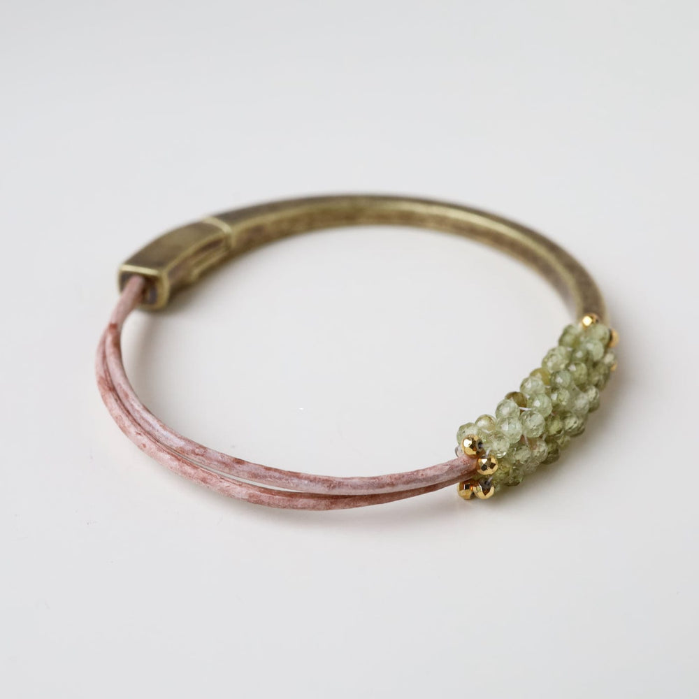 
                  
                    BRC-JM Hand Stitched Faceted Shaded Green Garnet Bracelet
                  
                