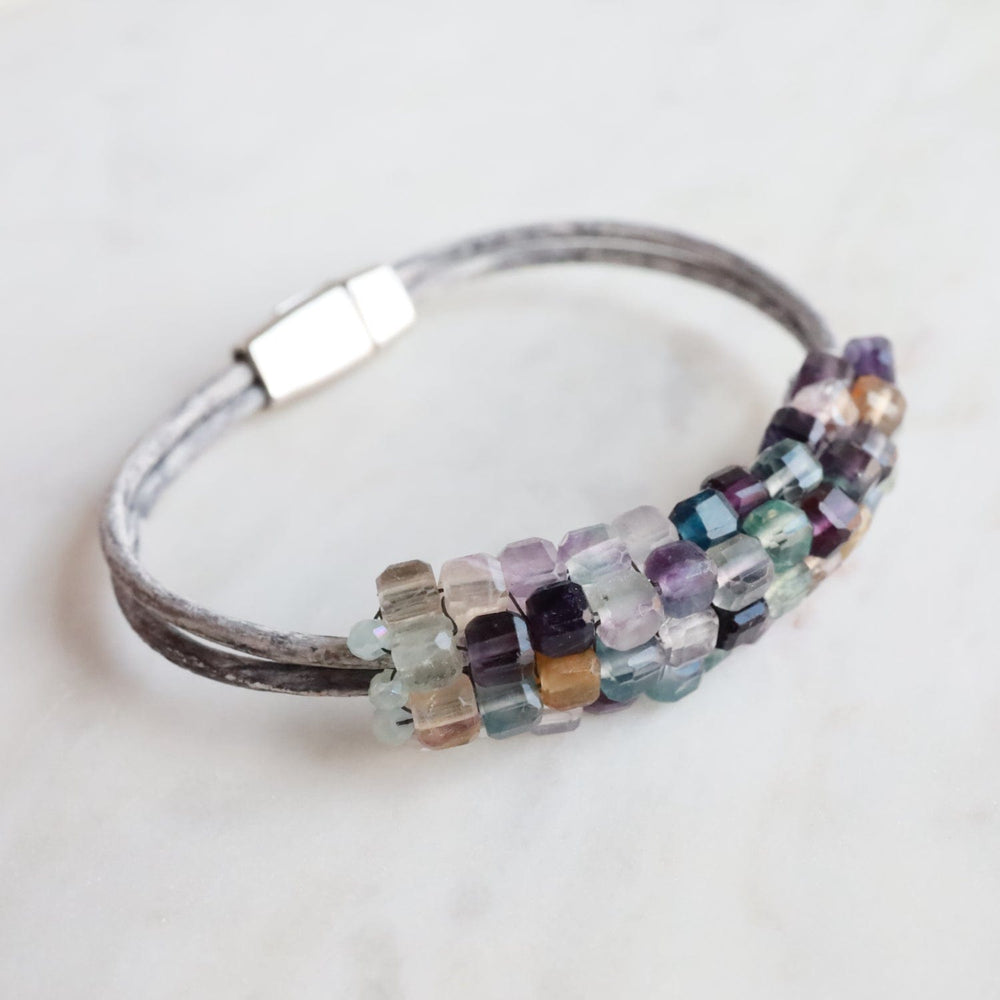 
                  
                    BRC-JM Hand Stitched Fluorite Cubes Bracelet
                  
                