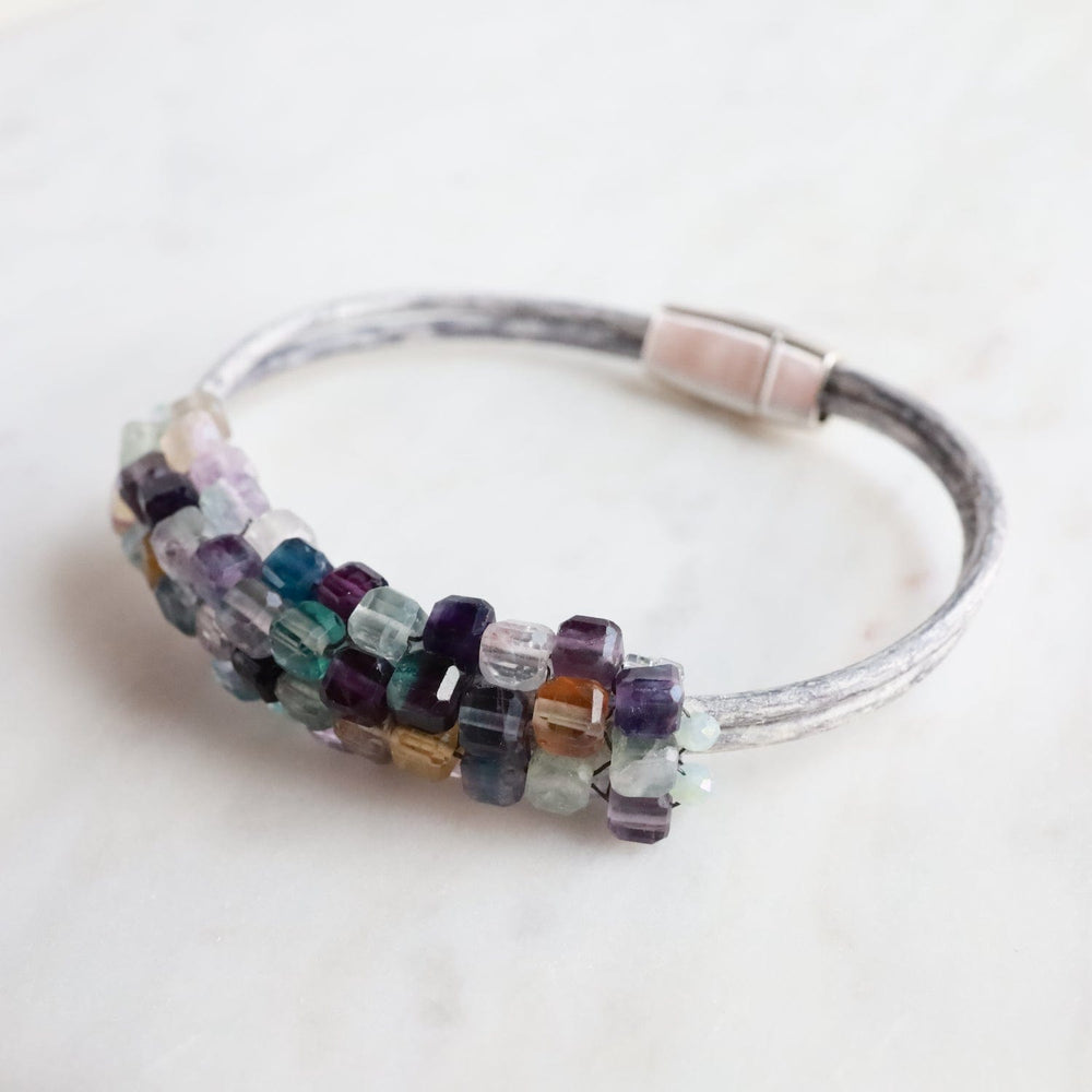 
                  
                    BRC-JM Hand Stitched Fluorite Cubes Bracelet
                  
                