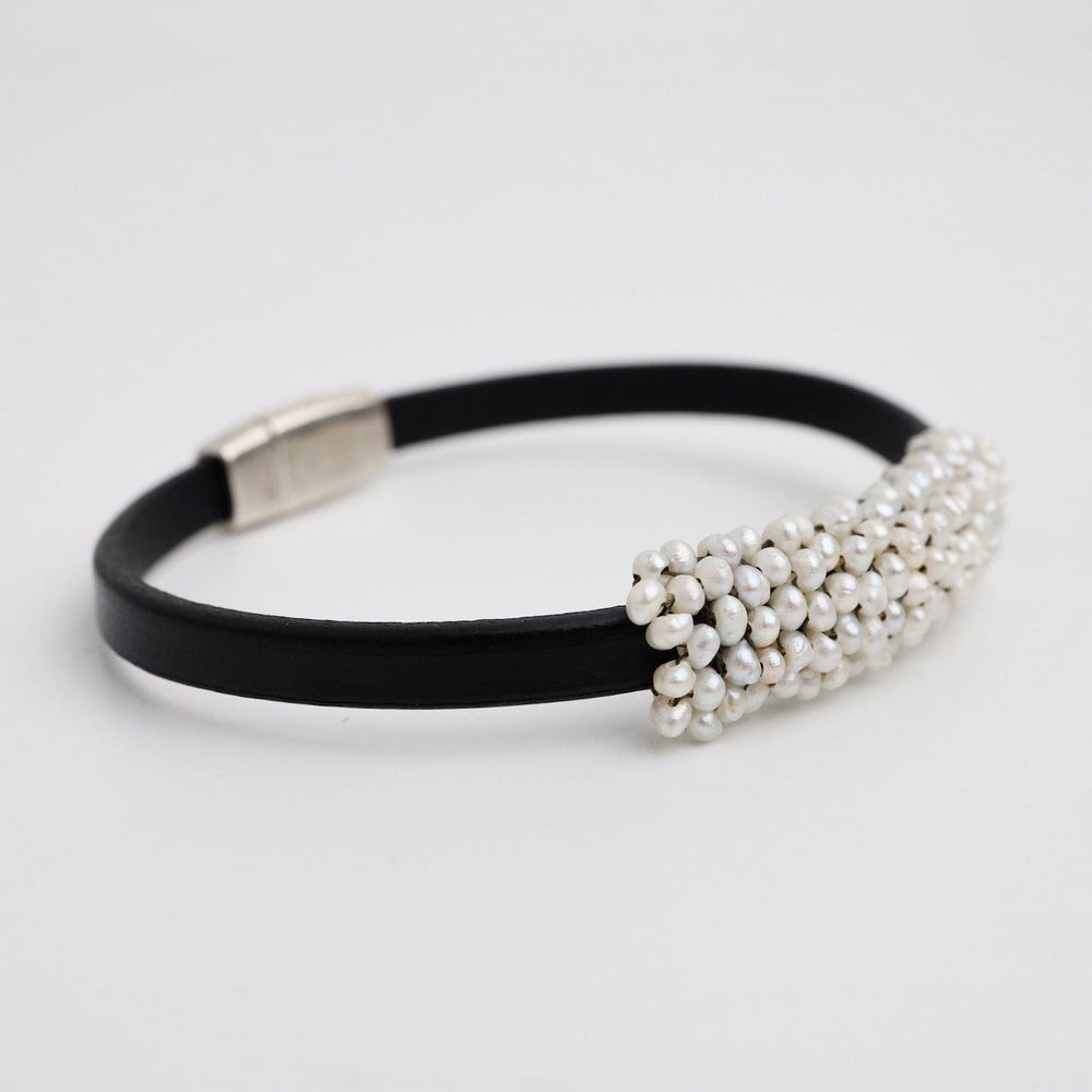 
                  
                    BRC-JM Hand Stitched Fresh Water Pearls On Black Flat Leather Bracelet
                  
                