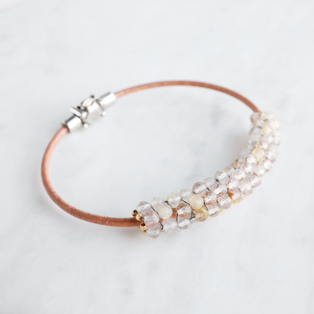 
                  
                    BRC-JM Hand Stitched Gold Rutilated Quartz Bracelet
                  
                