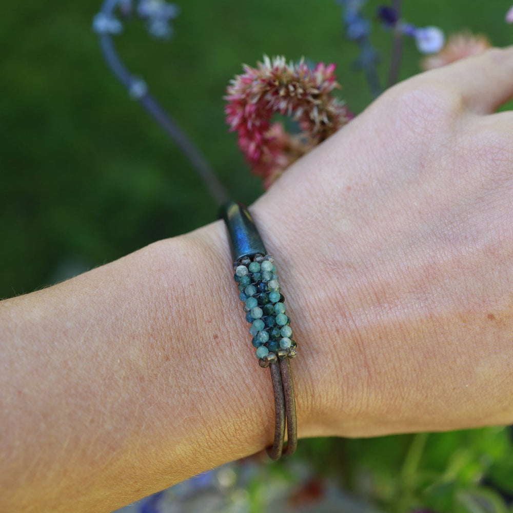 
                      
                        BRC-JM Hand Stitched Grandierite, Smokey Quartz Trim Bracelet
                      
                    