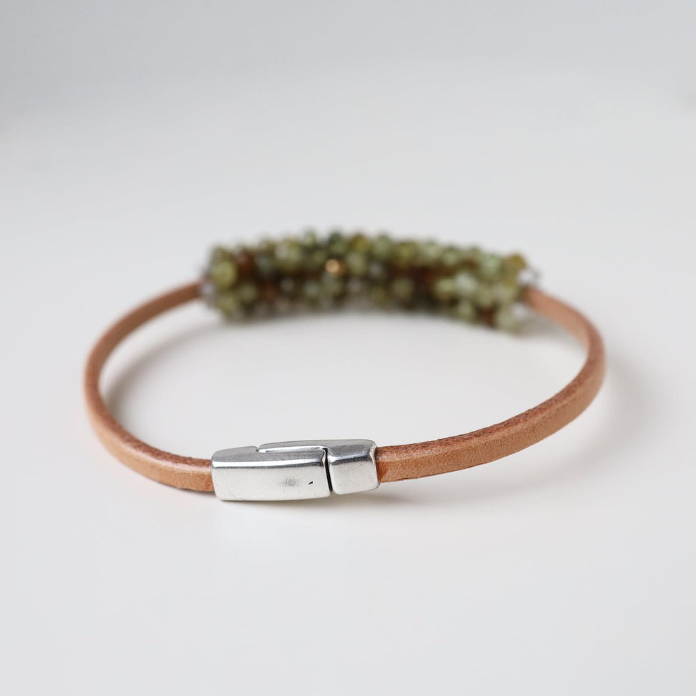 
                  
                    BRC-JM Hand Stitched Green Garnets Bracelet
                  
                