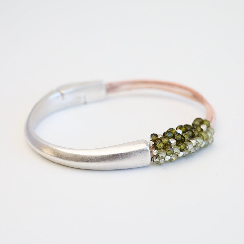 
                  
                    BRC-JM Hand Stitched Green Zircon & Sterling Silver Mix 1/2 Cuff Bracelet
                  
                