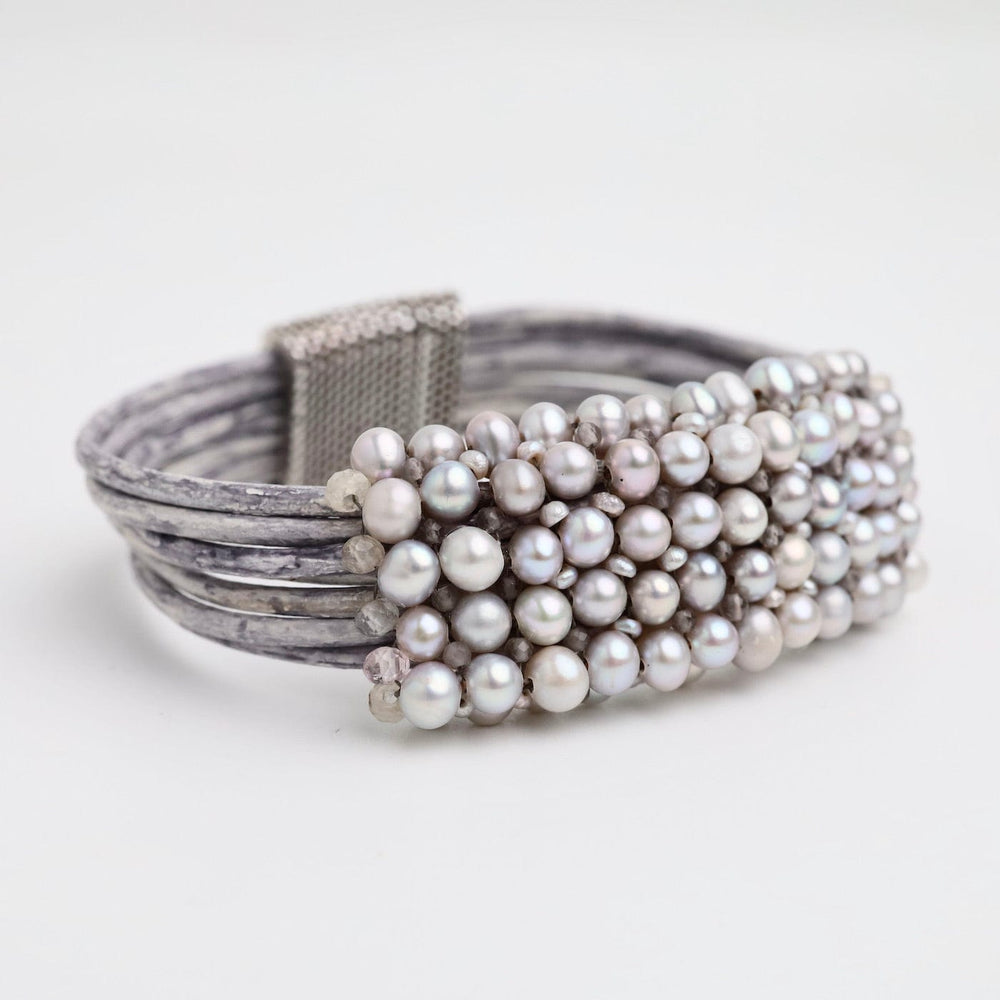 
                  
                    BRC-JM Hand Stitched Grey Pearls Infused with Smokey Quartz Leather Bracelet
                  
                