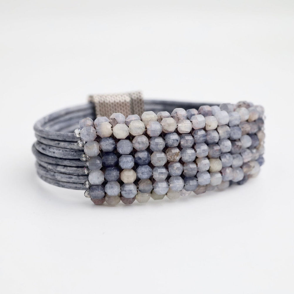 
                  
                    BRC-JM Hand Stitched Iolite Cubes Leather Bracelet
                  
                