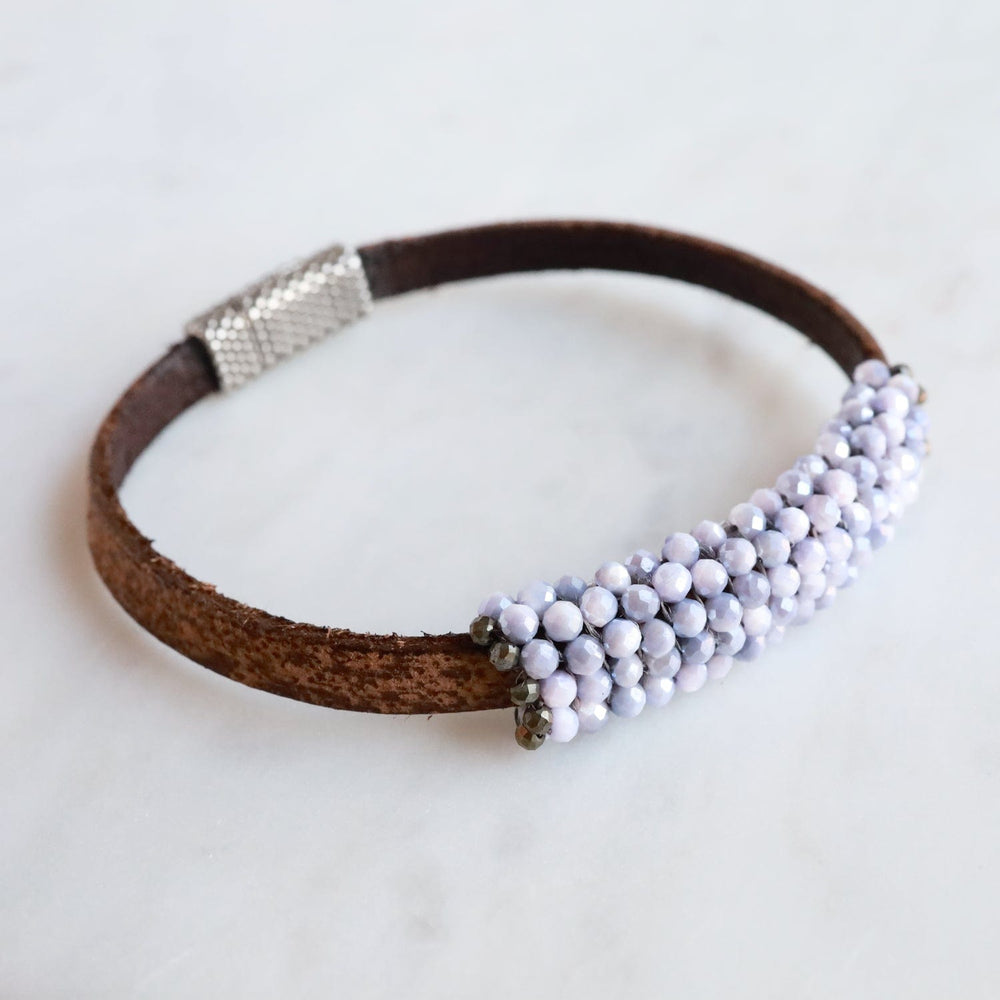 
                  
                    BRC-JM Hand Stitched Lavender Coated Moonstones Bracelet
                  
                