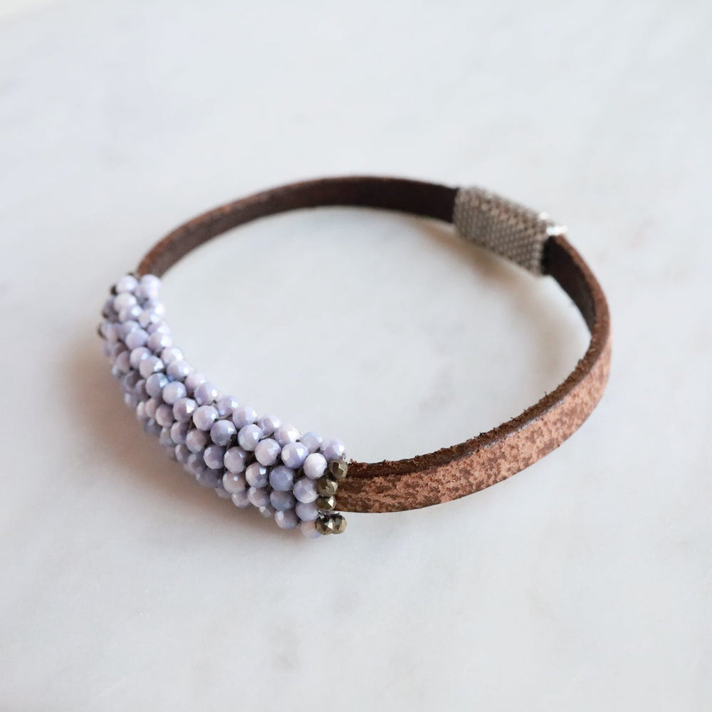 
                  
                    BRC-JM Hand Stitched Lavender Coated Moonstones Bracelet
                  
                