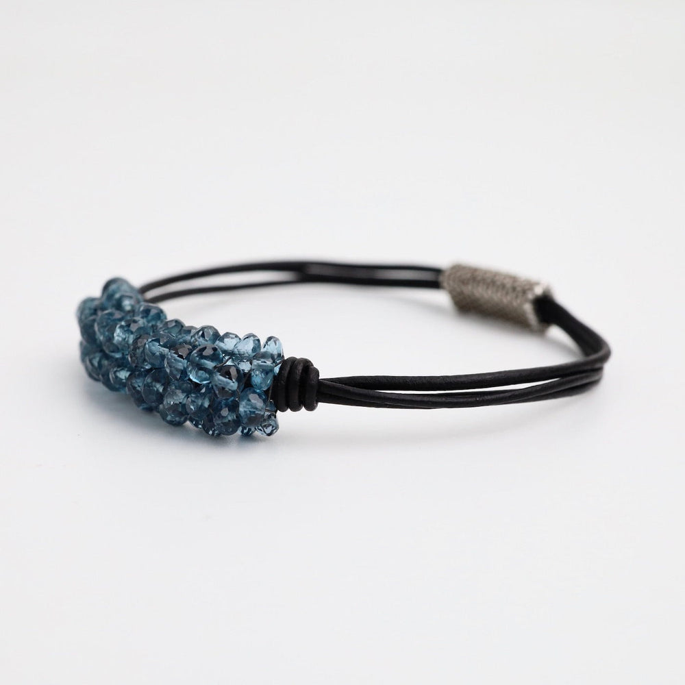 
                  
                    BRC-JM Hand Stitched London Blue Topaz Black Leather Bracelet
                  
                