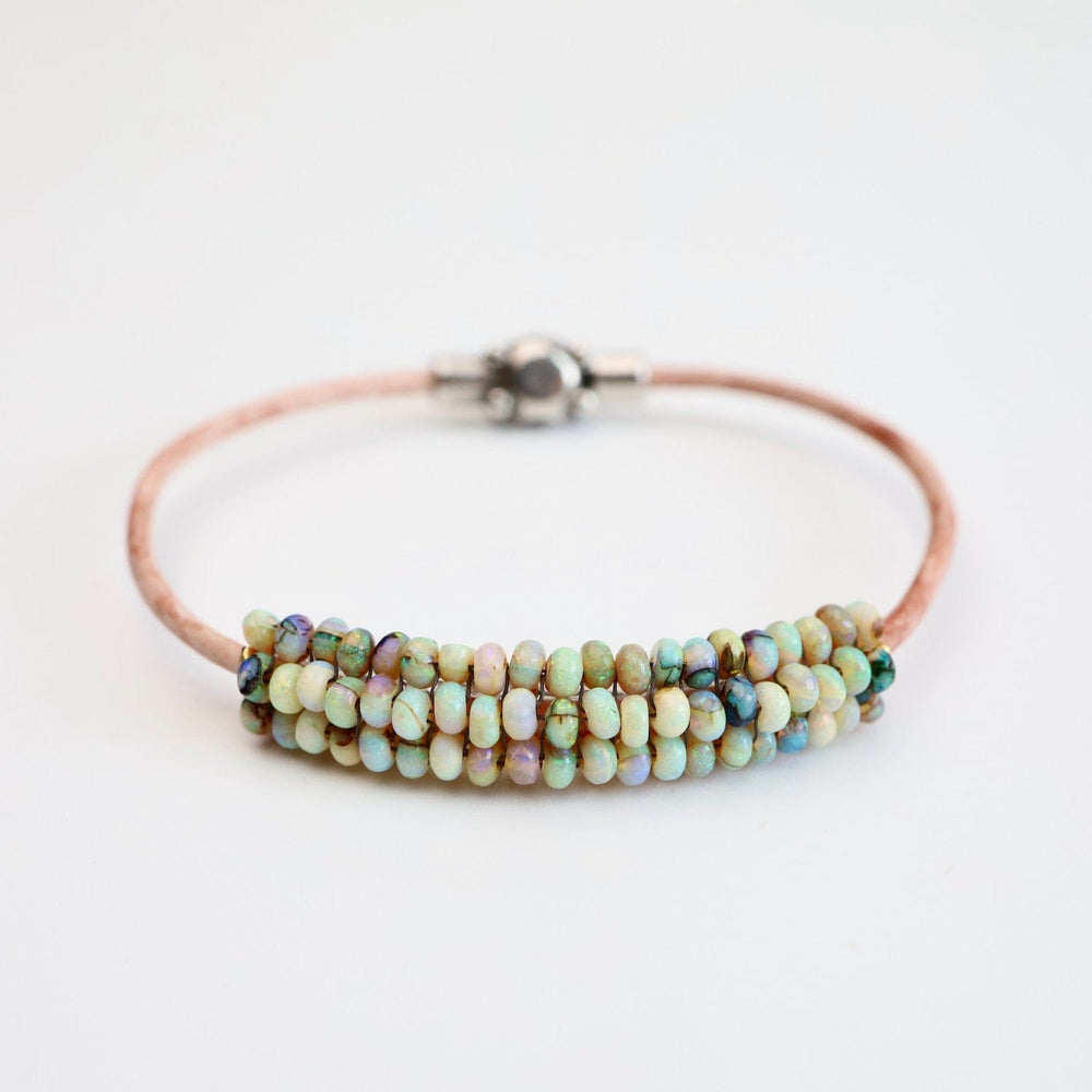 
                  
                    BRC-JM Hand Stitched Mexican Opal Bracelet with Tiny Vermeil Trim
                  
                