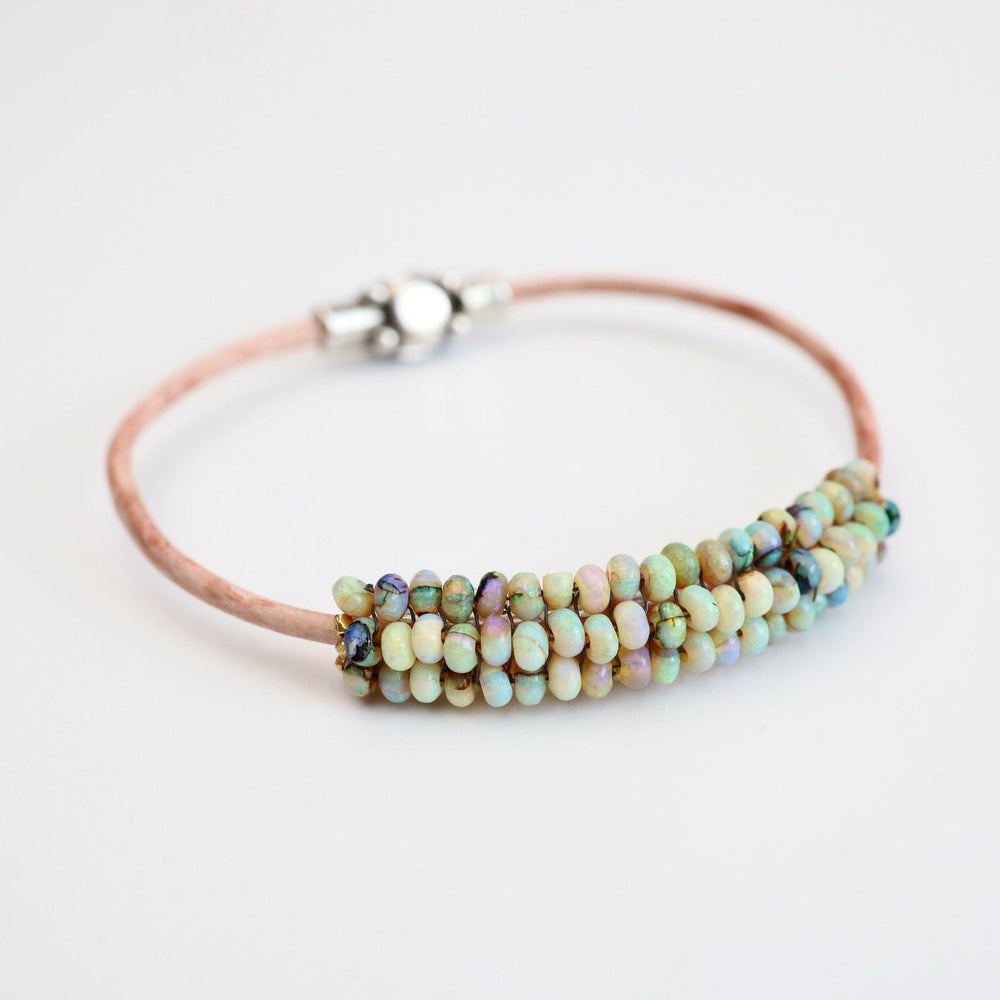 
                  
                    BRC-JM Hand Stitched Mexican Opal Bracelet with Tiny Vermeil Trim
                  
                