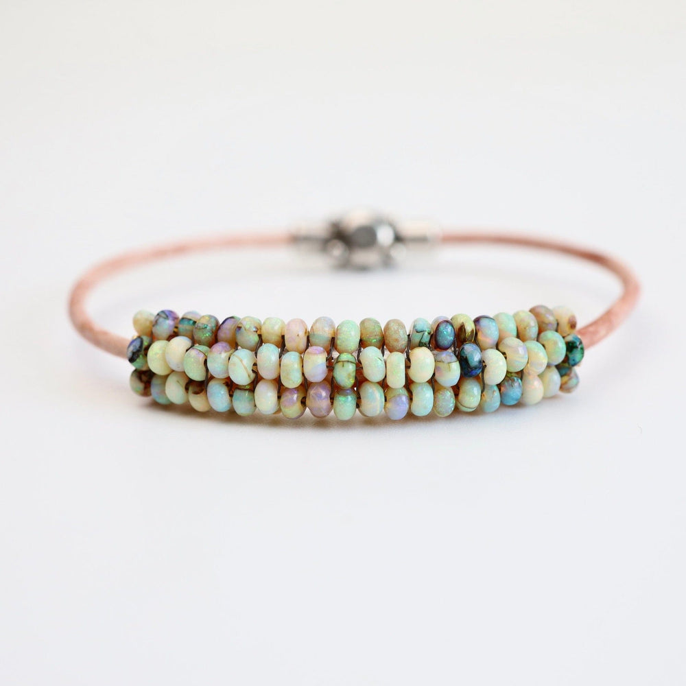 
                  
                    BRC-JM Hand Stitched Mexican Opal Bracelet with Tiny Vermeil Trim
                  
                