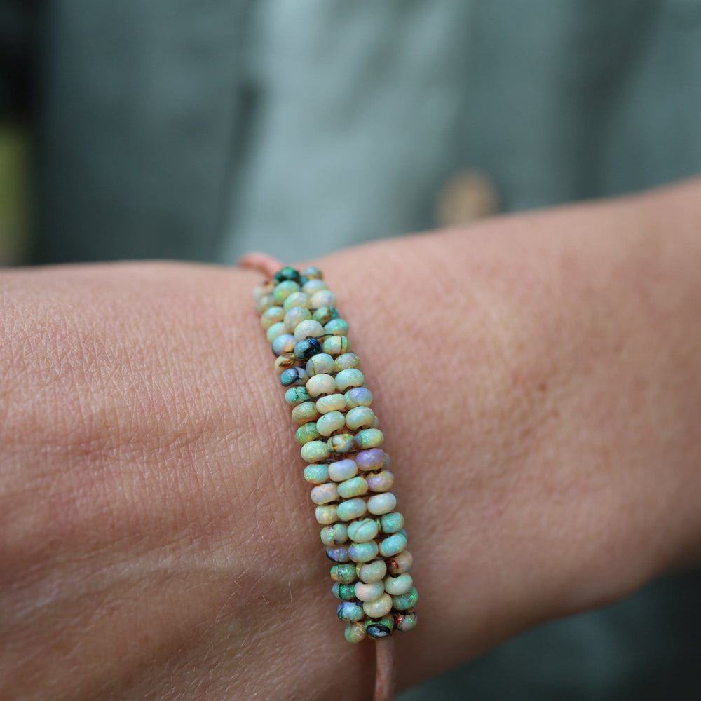 
                  
                    BRC-JM Hand Stitched Mexican Opal Bracelet with Tiny Vermeil Trim
                  
                