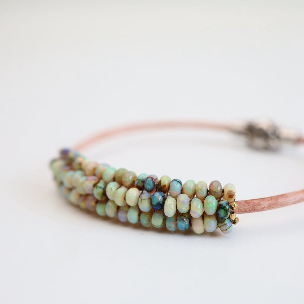 
                  
                    BRC-JM Hand Stitched Mexican Opal Bracelet with Tiny Vermeil Trim
                  
                