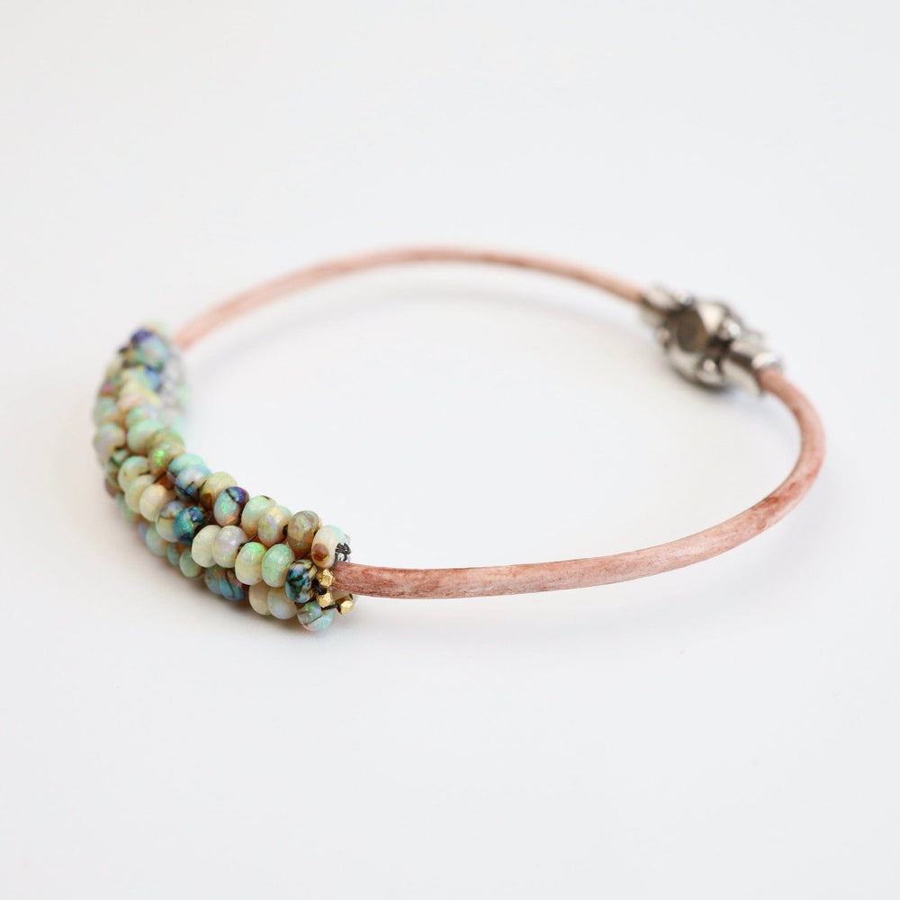 
                  
                    BRC-JM Hand Stitched Mexican Opal Bracelet with Tiny Vermeil Trim
                  
                