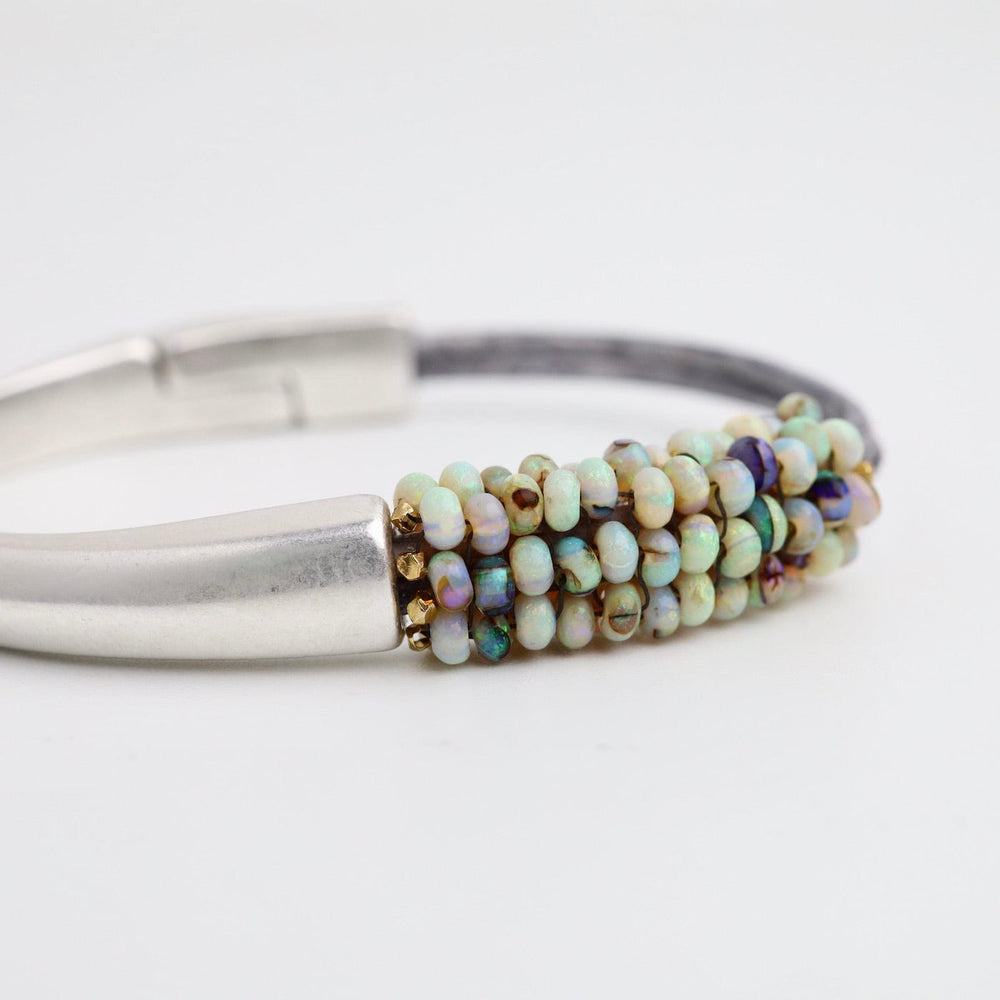 
                  
                    BRC-JM Hand Stitched Mexican Opal Half Cuff Bracelet
                  
                