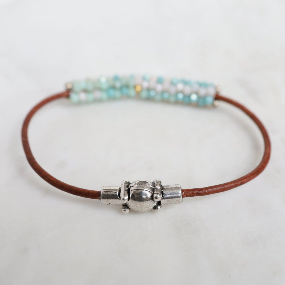 
                  
                    BRC-JM Hand Stitched Mixed Crystals in Aqua, Mint & Pale Pink on Brown Leather Bracelet
                  
                