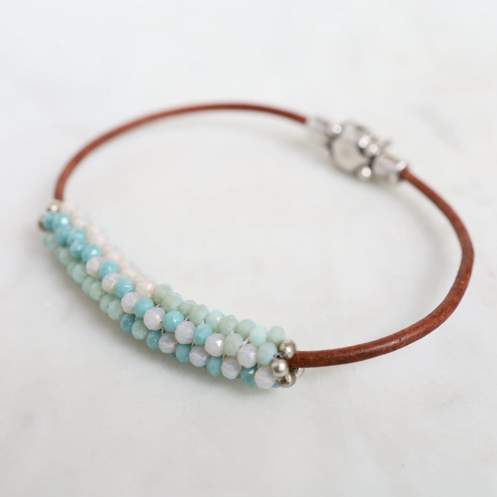 
                  
                    BRC-JM Hand Stitched Mixed Crystals in Aqua, Mint & Pale Pink on Brown Leather Bracelet
                  
                