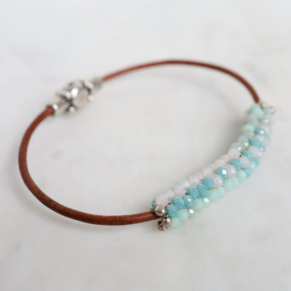 
                  
                    BRC-JM Hand Stitched Mixed Crystals in Aqua, Mint & Pale Pink on Brown Leather Bracelet
                  
                