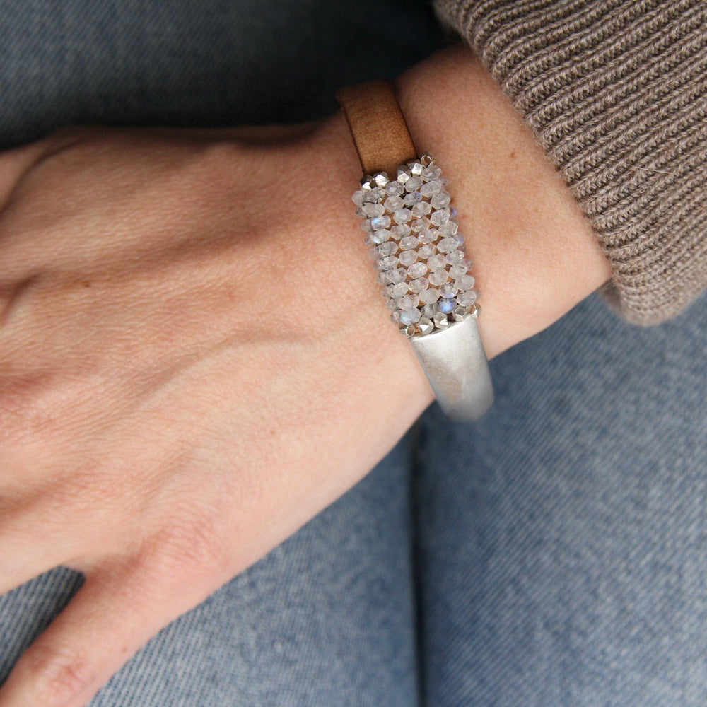 
                  
                    BRC-JM Hand Stitched Moonstone with Sterling Silver Trim 1/2 Cuff Bracelet
                  
                