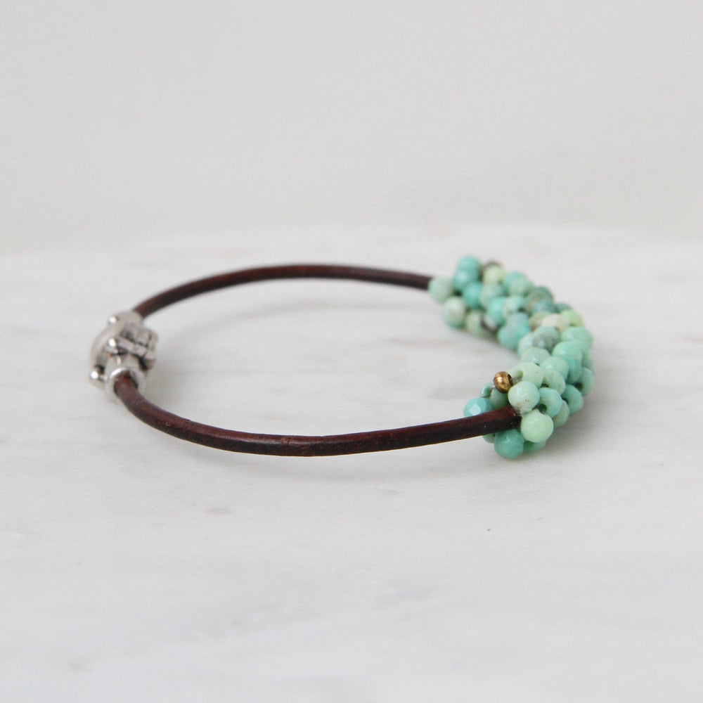 
                  
                    BRC-JM Hand Stitched Moss Green Opals Bracelet
                  
                